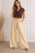 Pantalón palazzo amarillo con lunares marrones